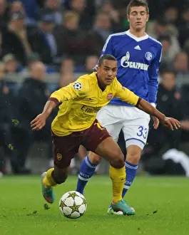 Schalke 04 V Arsenal 2012-13 Prints: Theo Walcott Dashes Past Romas Neustadter: Arsenal vs