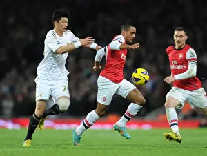 Arsenal V Swansea 2012-13 Prints: Theo Walcott Dashes Past Sung-Yueng Ki: Arsenal vs Swansea City, Premier League 2012-13