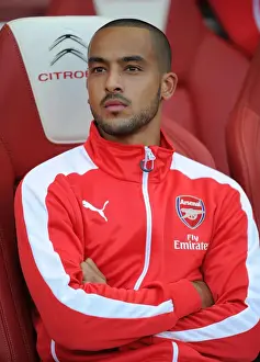 Arsenal V Burnley 2014/15 Prints: Theo Walcott: Idle on the Arsenal Bench during Arsenal vs Burnley, Premier League 2014/15