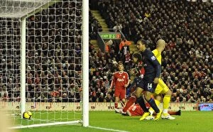 Images Dated 13th December 2009: Theo Walcott looks on as Glen Johnson put through his own net for the 1st Arsenal goal