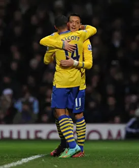 West Ham United V Arsenal 2013-14 Prints: Theo Walcott and Mesut Ozil Celebrate Arsenal's Second Goal vs