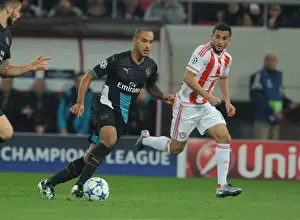 Olympiacos V Arsenal 2015-16 Prints: Theo Walcott Outmaneuvers Omar Elabdellaoui: A Football Masterclass at Olympiacos vs