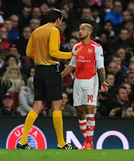Arsenal V Monaco 2104/15 Prints: Theo Walcott Protests to Referee Deniz Aytekin during Arsenal vs AS Monaco UEFA Champions League Match