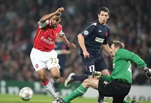 Images Dated 24th October 2007: Theo Walcott rounds Martin Vaniak (Slavia) to score Arsenals 3rd goal his 1st