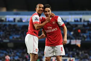 Theo Walcott and Samir Nasri celebrate the 3rd Arsenal goal, scored by Nicklas Bendtner
