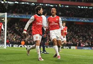 Theo Walcott and Samir Nasri Celebrate Arsenal's Second Goal vs. Partizan Belgrade in the UEFA Champions League