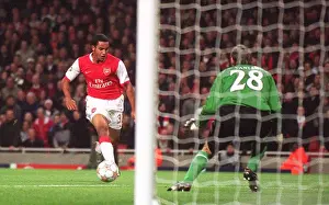 Theo Walcott scores his 2nd Arsenals 5th past Martin Vaniak (Slavia)