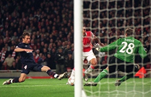 Arsenal v Slavia Prague 2007-08 Collection: Theo Walcott scores his 2nd goal, Arsenals 5th, past martin Vaniak (Slavia)