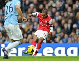 Images Dated 14th December 2013: Theo walcott scores Arsenals and his 2nd goal. Manchester City 6: 3 Arsenal. Barclays