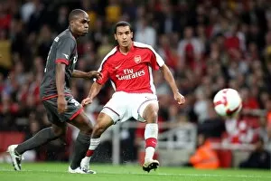 Images Dated 27th August 2008: Theo Walcott scores Arsenals 3rd goal under pressure