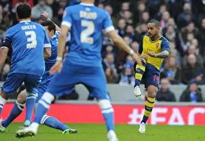 Brighton And Hove Albion V Arsenal - FA Cup 2014/15 Prints: Theo Walcott Scores First Goal: Arsenal Triumphs Over Brighton & Hove Albion in FA Cup Fourth Round