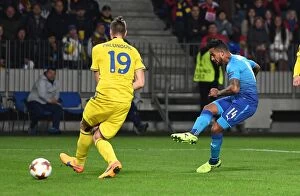 Images Dated 28th September 2017: Theo Walcott Scores Against Igor Stasevich: Arsenal's Victory over BATE Borisov in Europa League