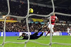 Swansea City v Arsenal 2011-12 Collection: Theo Walcott Scores Against Michel Vorm: Swansea City vs. Arsenal, Premier League 2011-12