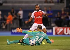 Dinamo Zagreb v Arsenal 2015-16 Collection: Theo Walcott Scores Against Former Team mate Eduardo: Arsenal's Triumph in the UEFA Champions