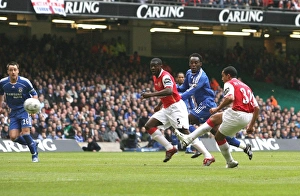 Arsenal v Chelsea, Carling Cup Final Gallery: Theo Walcott shoots past Petr Cech to score the Arsenal goal