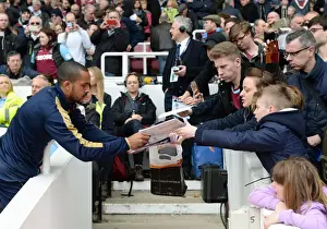 West Ham United V Arsenal 2015-16 Prints: Theo Walcott Signing Autographs Before Arsenal vs West Ham United, Premier League 2015-16