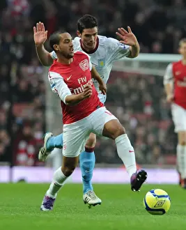 Arsenal V Aston Villa - FA Cup 2011-12 Prints: Theo Walcott Surges Past Ciaran Clark in FA Cup Fourth Round Clash: Arsenal vs