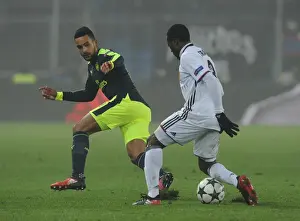 FC Basel V Arsenal 2016-17 Prints: Theo Walcott vs Adama Traore: Clash in the UEFA Champions League between FC Basel and Arsenal