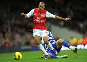 Arsenal V Queens Park Rangers 2011-12 Prints: Theo Walcott vs. Adel Taarabt: A Skillful Showdown at the Emirates (Arsenal vs)