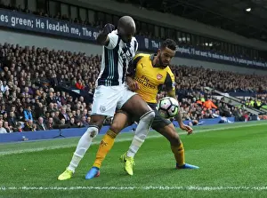 West Bromwich Albion V Arsenal 2016-17 Prints: Theo Walcott vs Allan Nyom: Intense Battle in West Bromwich Albion vs Arsenal Premier League Clash