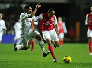 Swansea City V Arsenal 2011-12 Prints: Theo Walcott vs Ashley Williams: A Football Rivalry Erupts at Swansea City (2011-12)