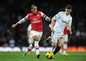 Arsenal V Swansea 2012-13 Prints: Theo Walcott vs. Ben Davies: A Premier League Battle at Emirates Stadium (Arsenal vs)