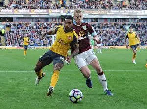 Burnley V Arsenal 2016-17 Prints: Theo Walcott vs Ben Mee: A Premier League Showdown at Burnley's Turf Moor (2016-17)