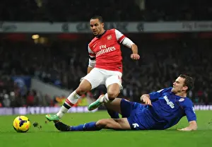 Arsenal V Cardiff City 2013-14 Prints: Theo Walcott vs Ben Turner: A Footballing Battle at the Emirates - Arsenal vs Cardiff City