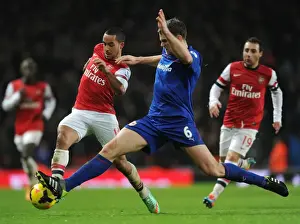 Arsenal V Cardiff City 2013-14 Prints: Theo Walcott vs Ben Turner: Intense Battle at the Emirates - Arsenal vs Cardiff City