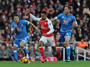 Arsenal V AFC Bournemouth 2016/17 Prints: Theo Walcott vs. Dan Gosling and Harry Arter: Intense Battle at Arsenal v AFC Bournemouth (2016/17)