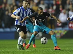 Sheffield Wednesday v Arsenal - Capital One Cup 2015-16 Collection: Theo Walcott vs Daniel Pudil: A Football Rivalry in the Capital One Cup - Sheffield Wednesday vs