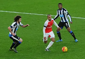 Arsenal V Newcastle United 2015-16 Prints: Theo Walcott vs. Fabricio Coloccini and Georginio Wijnaldum: A Battle at the Emirates