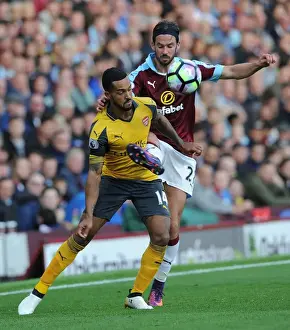 Burnley V Arsenal 2016-17 Prints: Theo Walcott vs George Boyd: A Premier League Showdown at Burnley's Turf Moor (2016-17)