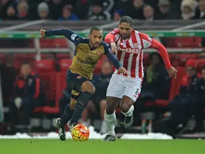 Stoke City V Arsenal 2015-16 Prints: Theo Walcott vs. Glen Johnson: A Footballing Battle at Stoke City (Premier League 2015-16)
