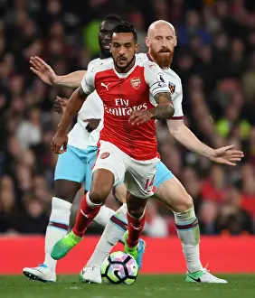 Arsenal V West Ham United 2016-17 Prints: Theo Walcott vs. James Collins: A Premier League Battle at Arsenal
