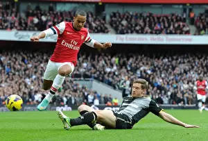 Arsenal V Tottenham Hotspur 2012-13 Prints: Theo Walcott vs Jan Vertonghen: Intense Battle in the Arsenal v Tottenham Rivalry