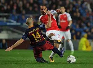 Theo Walcott vs Javier Mascherano: A Battle of Wits in the Barcelona vs Arsenal UEFA Champions League Clash