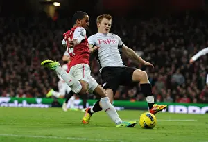 Arsenal V Fulham 2011-12 Prints: Theo Walcott vs. John Arne Riisse: A Battle at Emirates Stadium (Arsenal v Fulham)