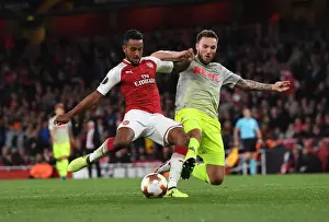 Arsenal V FC Köln 2017-18 Prints: Theo Walcott vs Jorge Mere: Intense Moment in Arsenal v FC Köln UEFA Europa League Clash