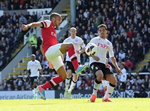 Images Dated 20th April 2013: Theo Walcott vs. Kieran Richardson: Intense Battle at Craven Cottage during Arsenal's Premier