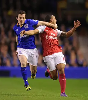 Everton V Arsenal 2011-12 Prints: Theo Walcott vs Leighton Baines: Intense Rivalry at Goodison Park (Everton vs Arsenal)