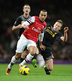 Arsenal V Liverpool 2012-13 Prints: Theo Walcott vs. Lucas Leiva: A Premier League Battle at the Emirates