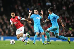 Arsenal V Marseille 2013-14 Prints: Theo Walcott vs. Mathieu Valbuena and Mario Lemina: Arsenal vs