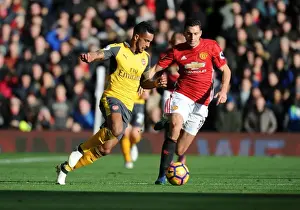 Manchester United V Arsenal 2016-17 Prints: Theo Walcott vs. Matteo Darmian: A Premier League Battle at Old Trafford (2016-17)