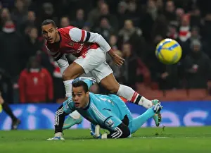 Arsenal V Swansea - FA Cup 3rd Rd Replay 2012-13 Prints: Theo Walcott vs Michel Vorm: A FA Cup Showdown at Arsenal's Emirates Stadium