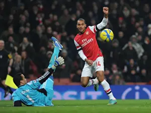 Arsenal V Swansea - FA Cup 3rd Rd Replay 2012-13 Prints: Theo Walcott vs Michel Vorm: A FA Cup Showdown at Arsenal's Emirates Stadium