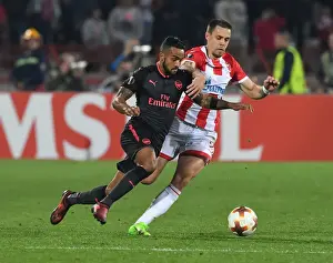 Red Star Belgrade V Arsenal 2017-18 Prints: Theo Walcott vs Milan Rodic: A Europa League Battle at Rajko Mitic Stadium