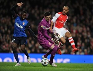 Images Dated 1st February 2009: Theo Walcott vs. Monaco's Defense: A Battle in the Arsenal vs. AS Monaco UCL Showdown