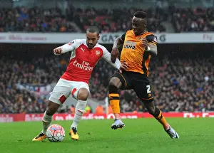 Arsenal V Hull City - FA Cup 2015-16 Prints: Theo Walcott vs. Moses Odubajo: A Battle at The Emirates - Arsenal vs