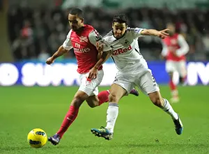 Theo Walcott vs Neil Taylor: Intense Battle in Swansea City vs Arsenal Premier League Clash